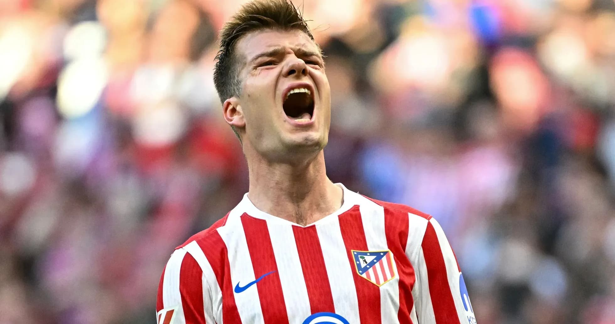 Jugador de Atlético de Madrid celebrando en el campo