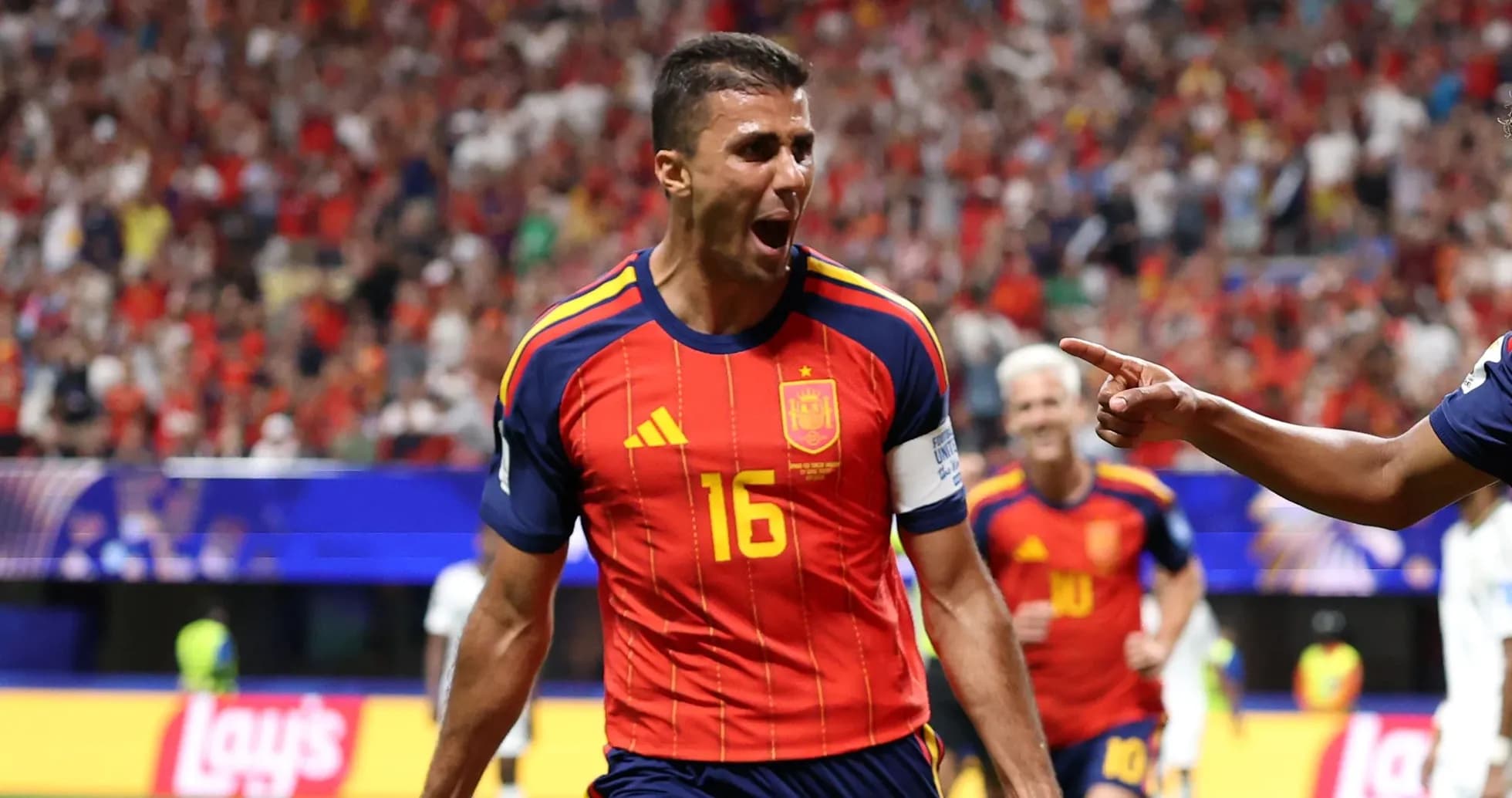 Jugador de España celebrando un gol en partido