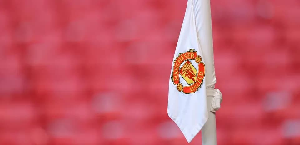 Esquinero con el logotipo de Manchester United