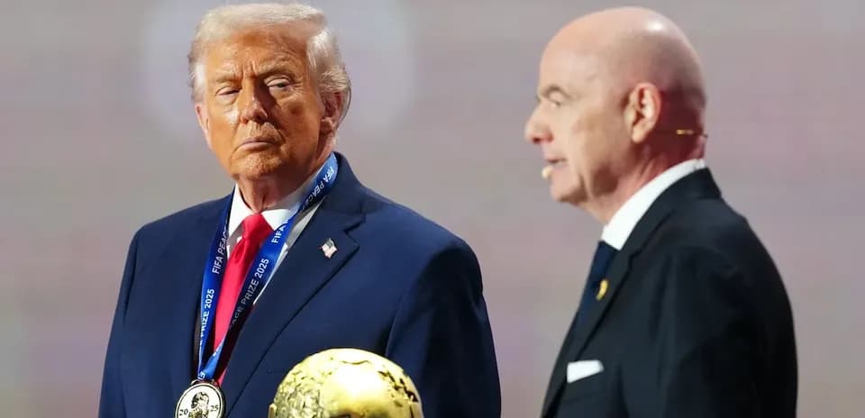 Donald Trump receiving FIFA Prize on stage