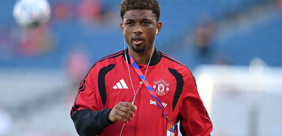 Jugador de Manchester United en calentamiento previo