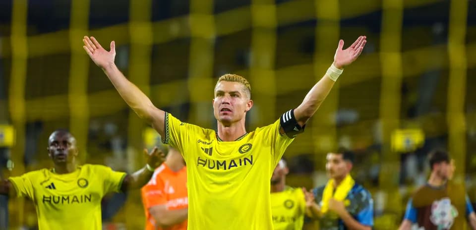 Jugador levantando las manos en celebración