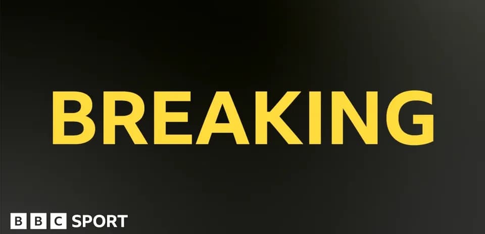 Texto en amarillo que dice 'BREAKING'