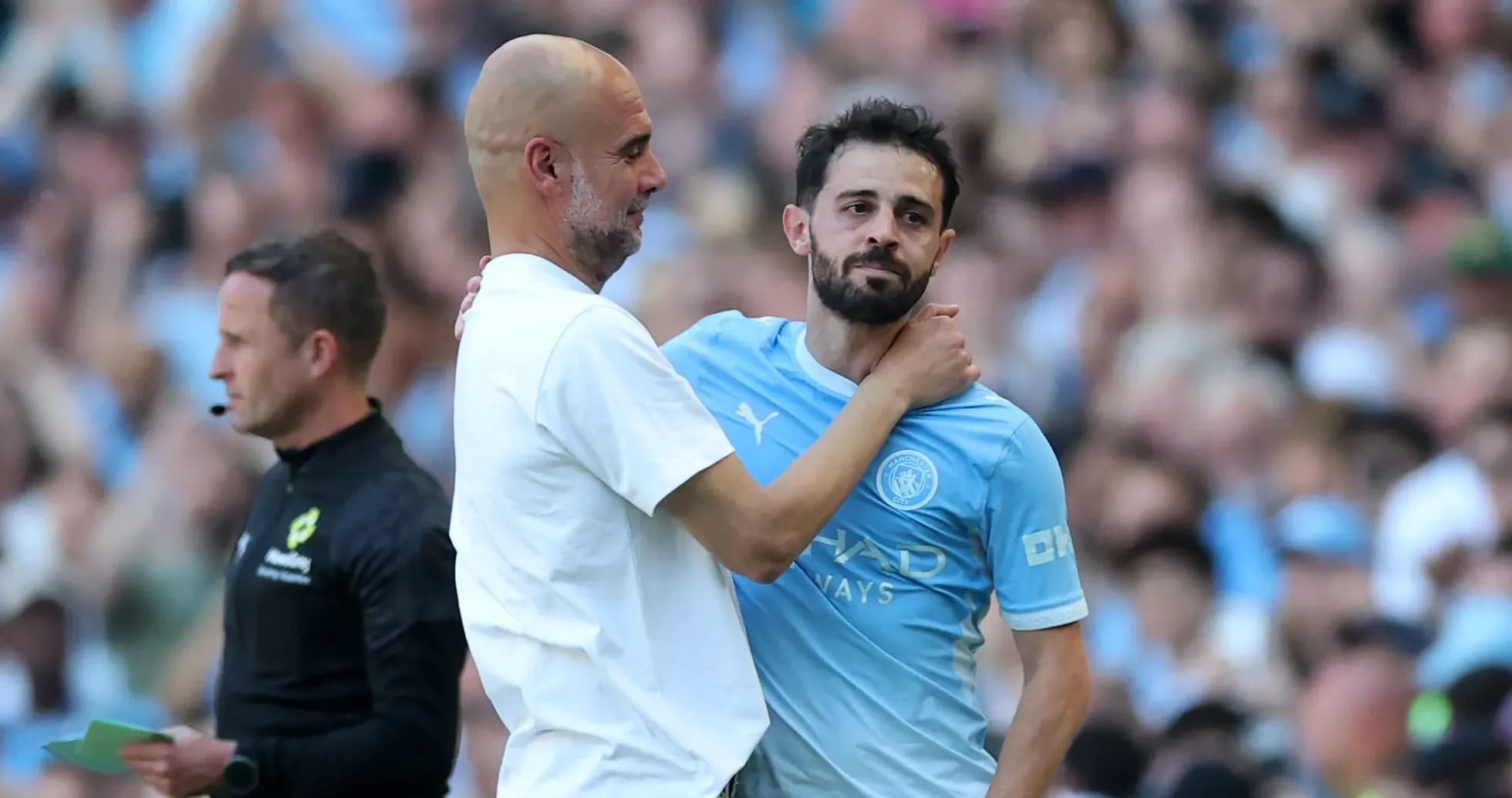 Entrenador y jugador de Manchester City en el campo