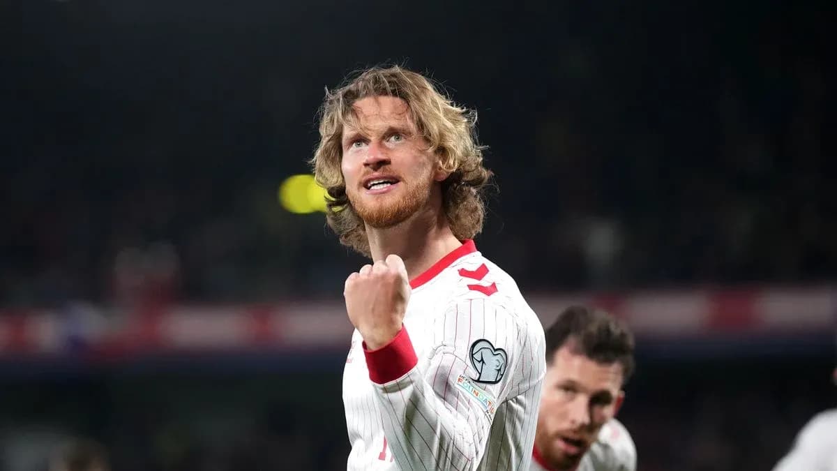 Jugador celebrando en partido de clasificación