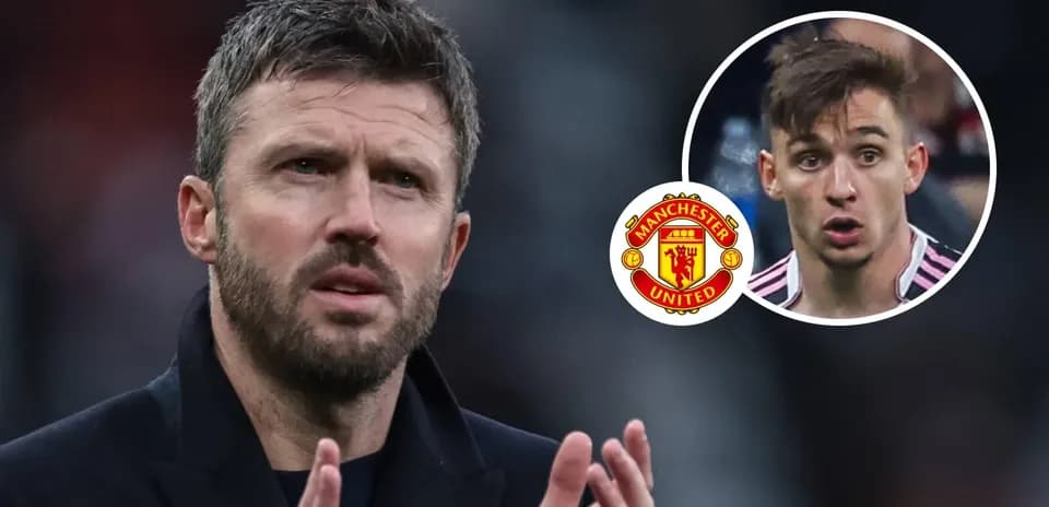 Michael Carrick gesturing with Manchester United logo