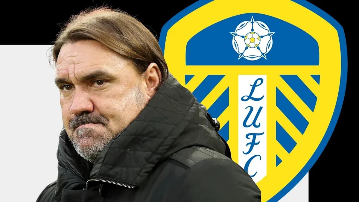Entrenador frente al escudo de Leeds United