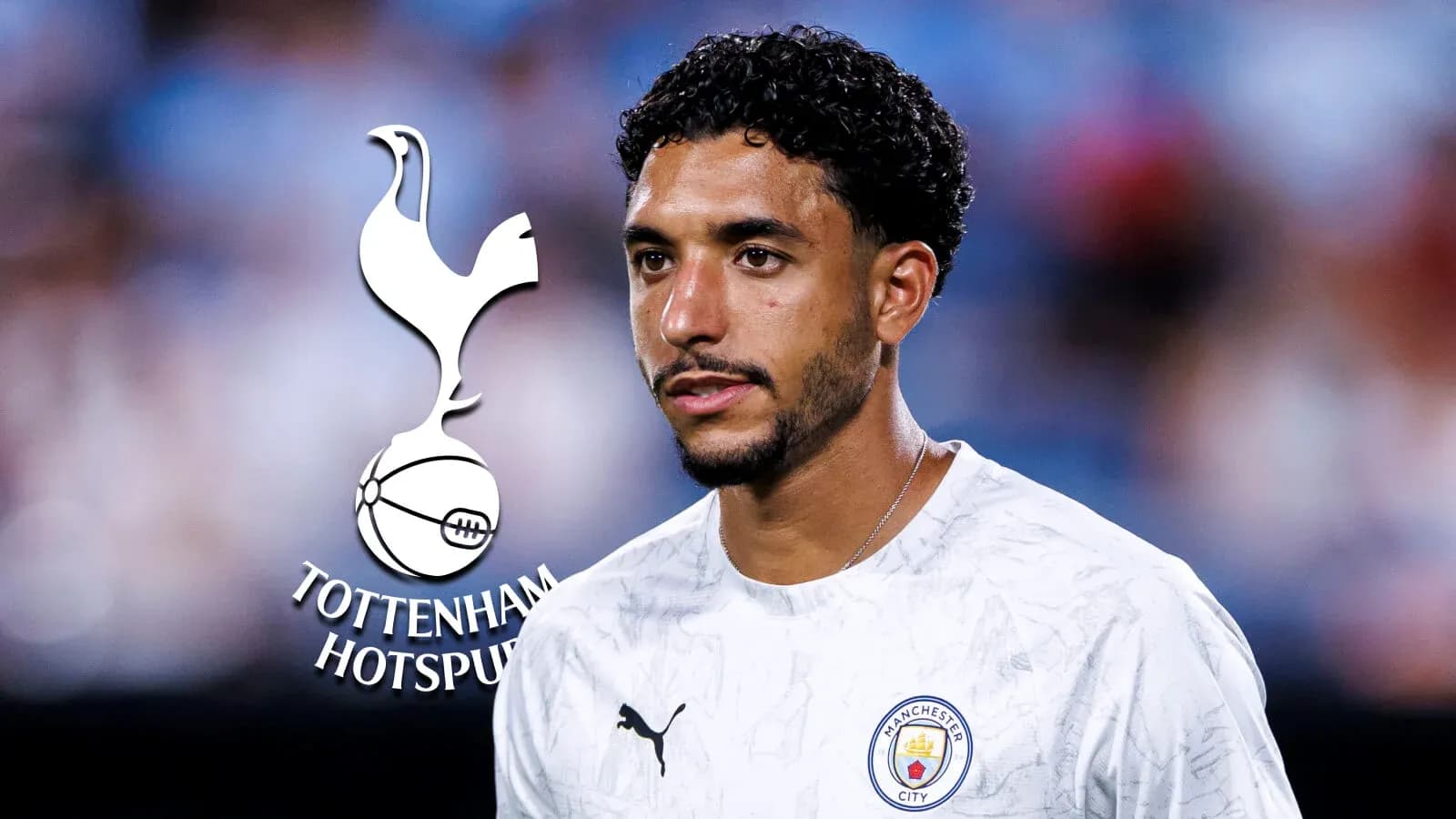 Jugador de fútbol en uniforme de Manchester City
