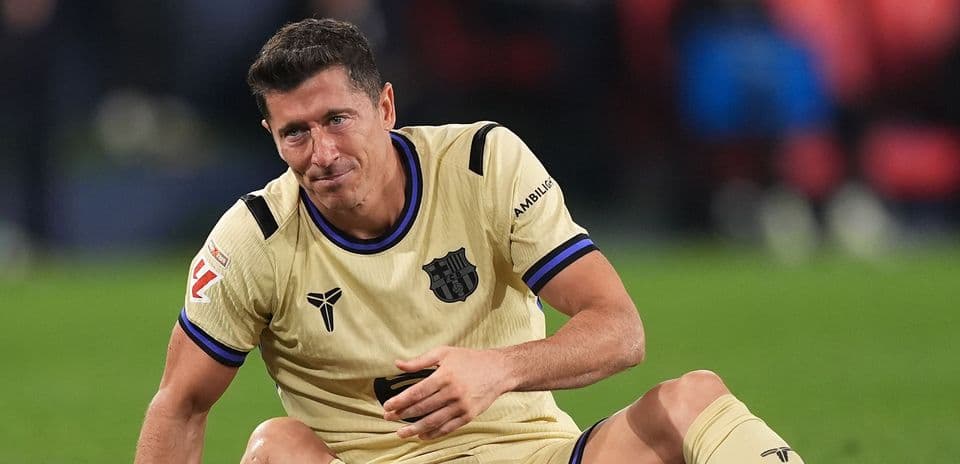 Jugador del Barcelona sentado en el campo