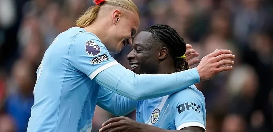 Jugadores de Manchester City celebrando un gol