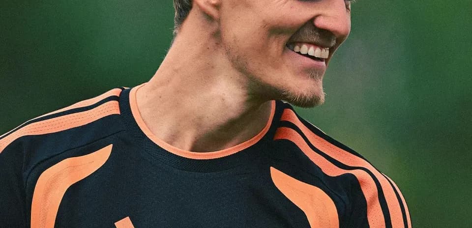 Jugador sonriendo durante la sesión de entrenamiento