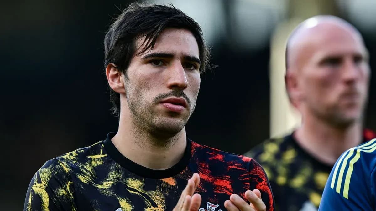 Jugador aplaudiendo durante el calentamiento en el campo