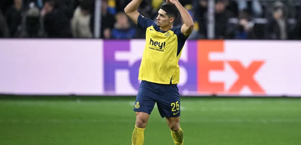 Jugador celebrando durante un partido de fútbol