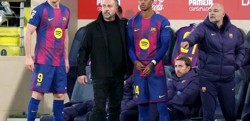 Jugadores del FC Barcelona en el banquillo durante partido