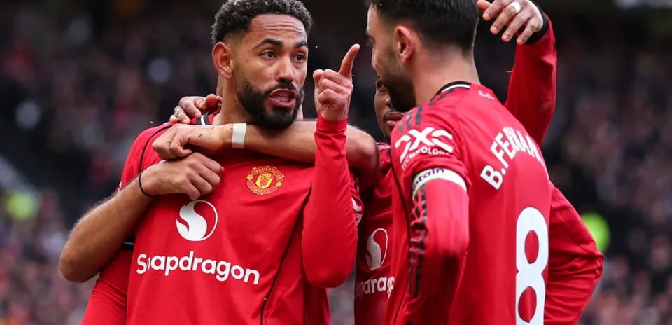 Jugadores de Manchester United celebrando una jugada