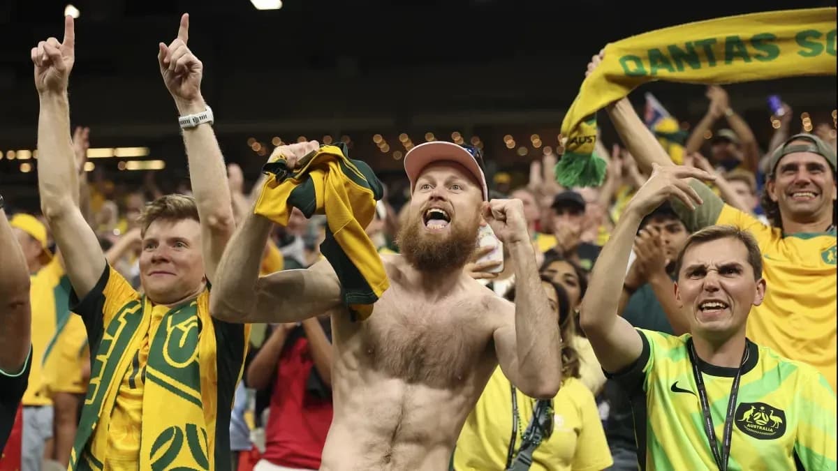 Aficionados de Australia celebrando en el estadio