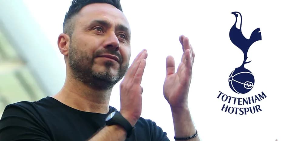Entrenador aplaudiendo durante un evento de Tottenham