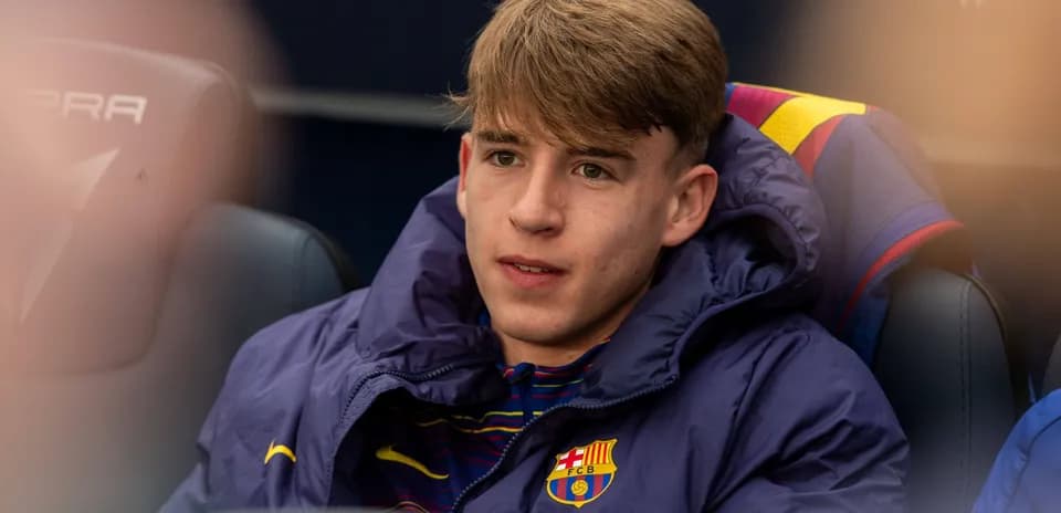 Jugador del FC Barcelona sentado en el banquillo