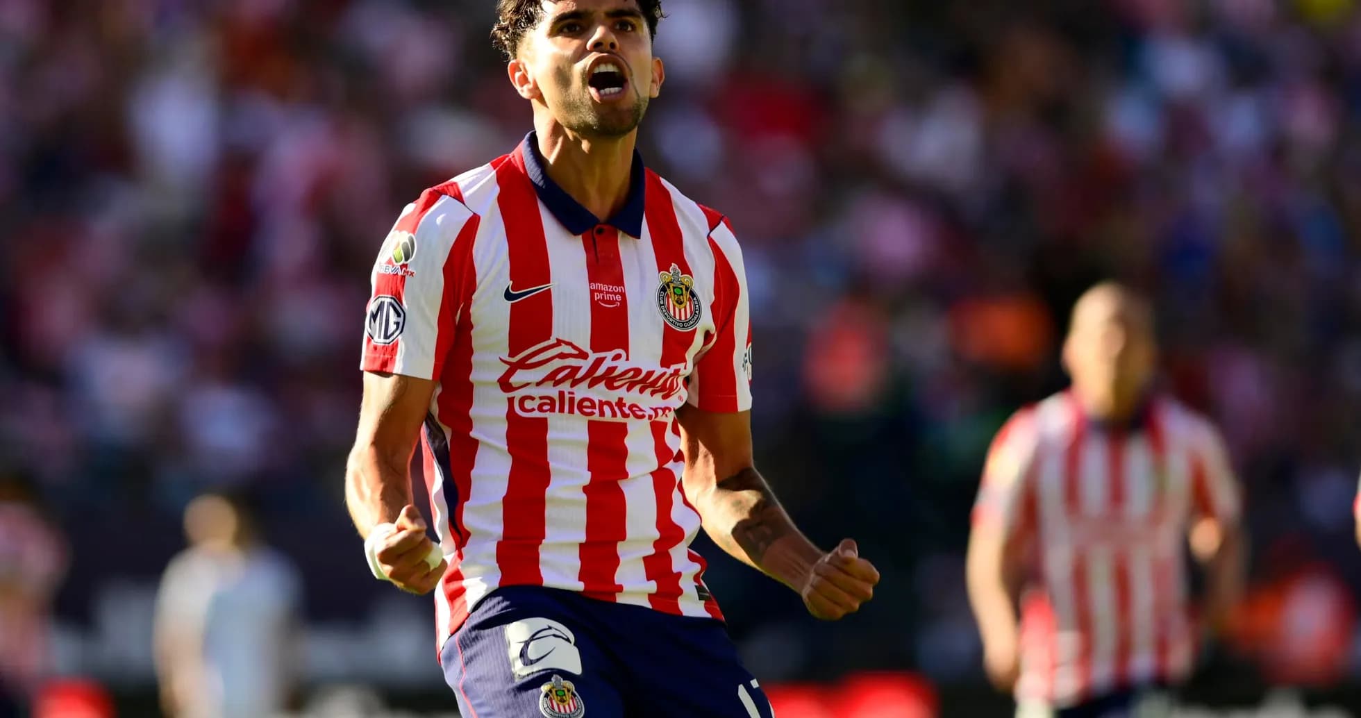 Jugador de Chivas celebrando un gol Jugador de Chivas celebrando un gol