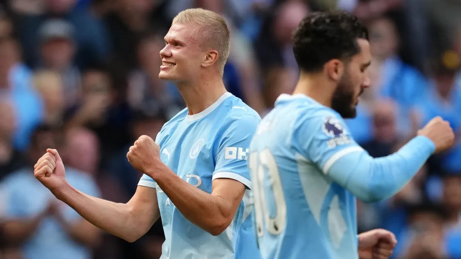 Jugador de Manchester City celebrando un gol Jugador de Manchester City celebrando un gol