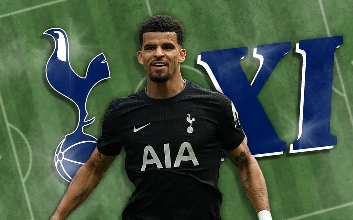 Jugador de Tottenham con camiseta negra en campo Jugador de Tottenham con camiseta negra en campo