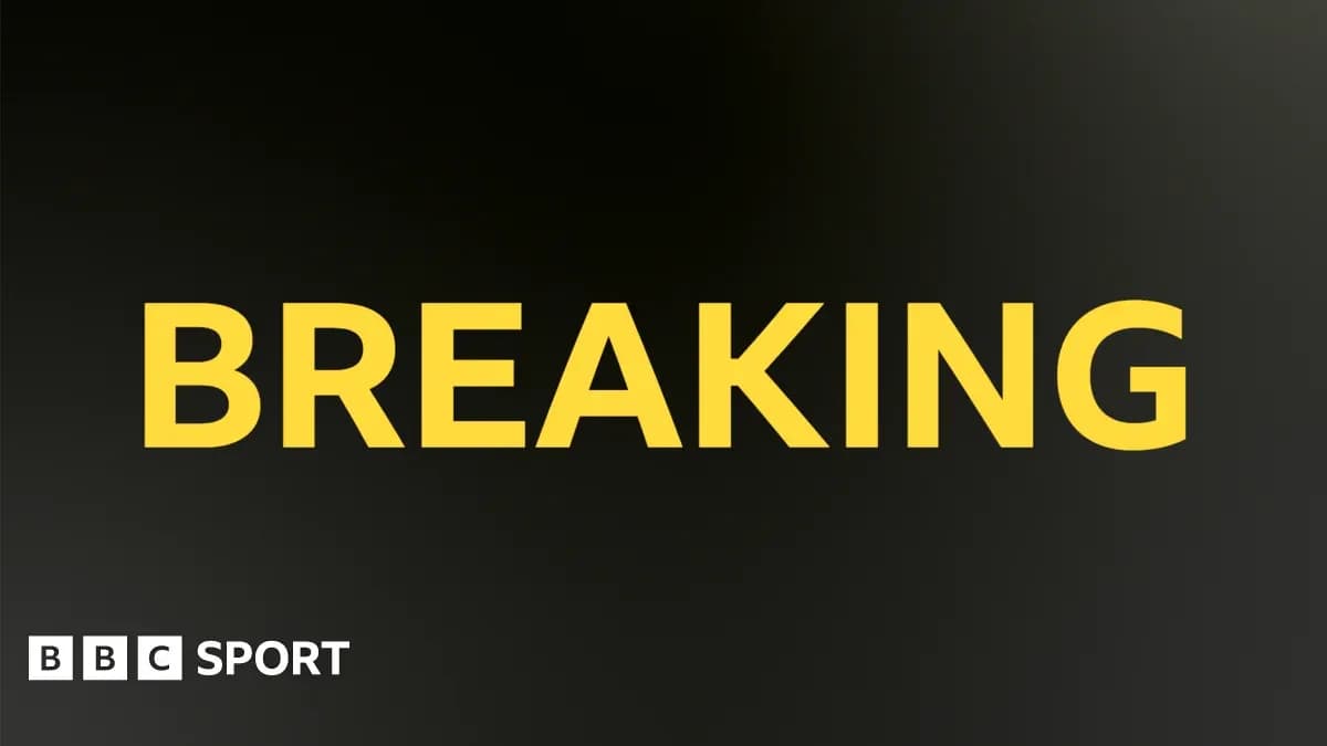 Texto en amarillo que dice 'BREAKING' Texto en amarillo que dice 'BREAKING'