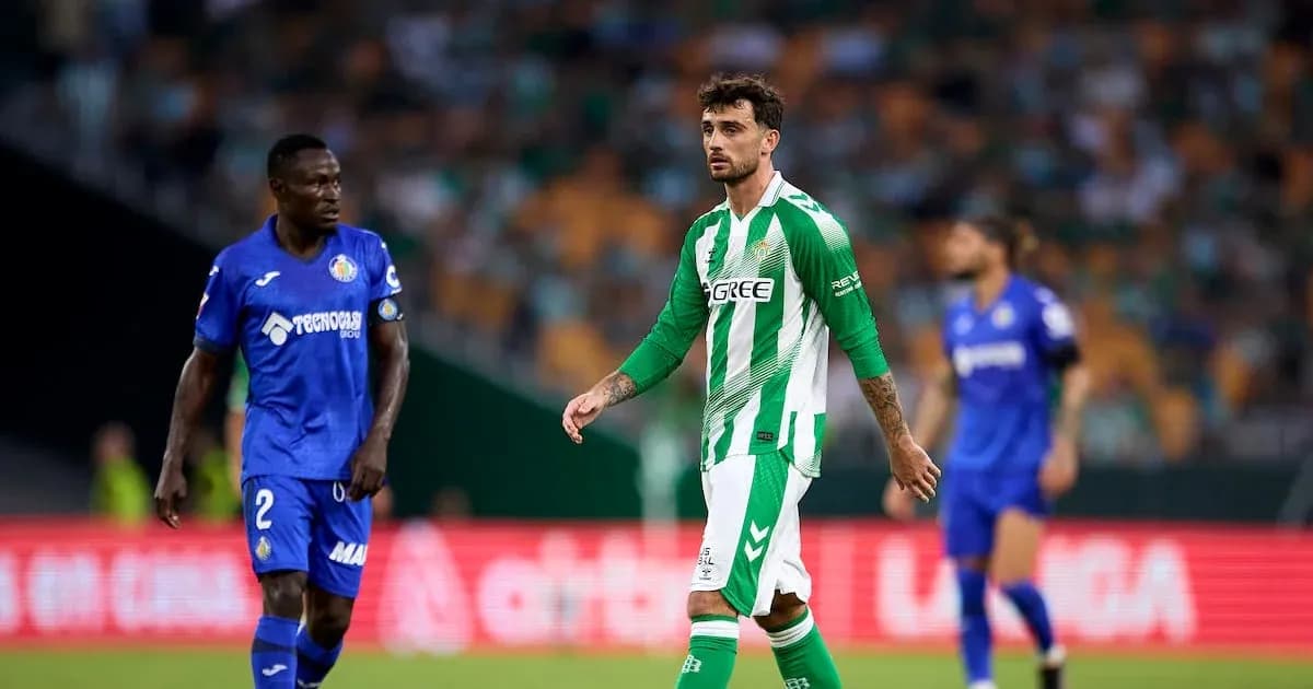 Jugadores de Betis y Getafe en el campo durante partido Jugadores de Betis y Getafe en el campo durante partido