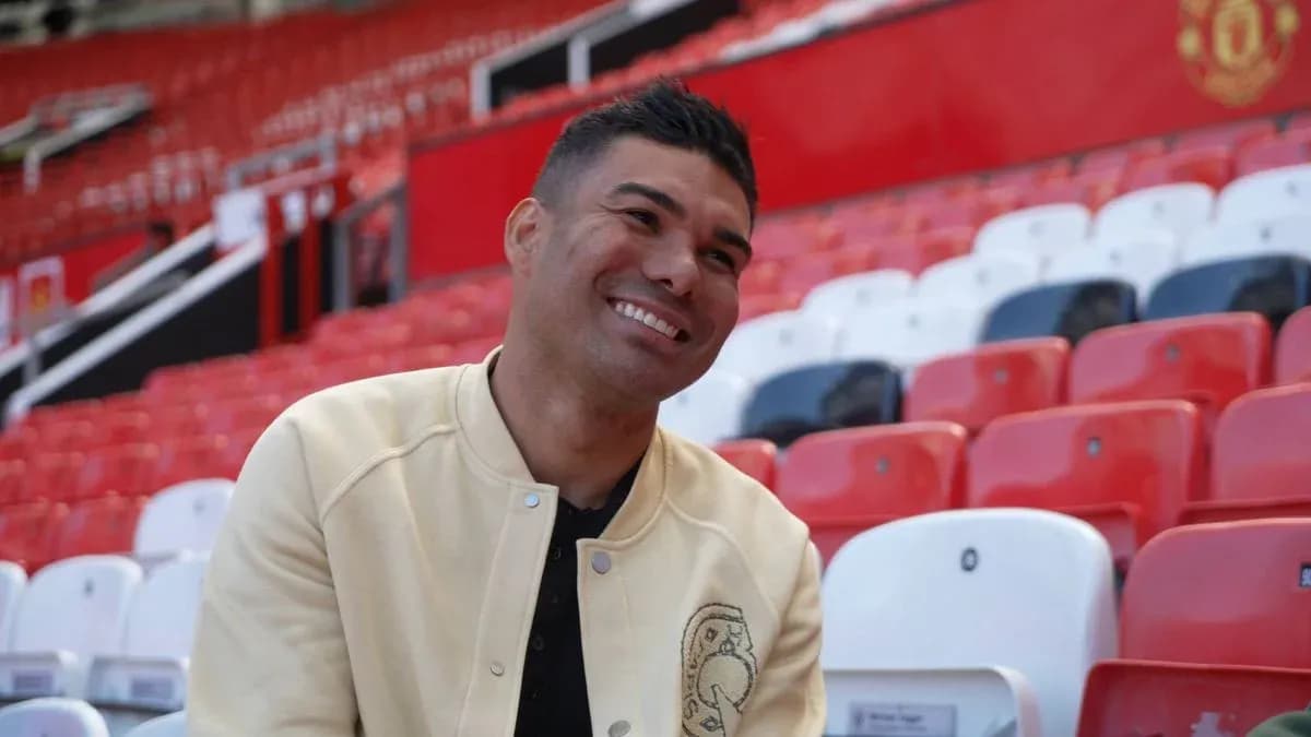 Jugador sentado en las gradas de Old Trafford Jugador sentado en las gradas de Old Trafford