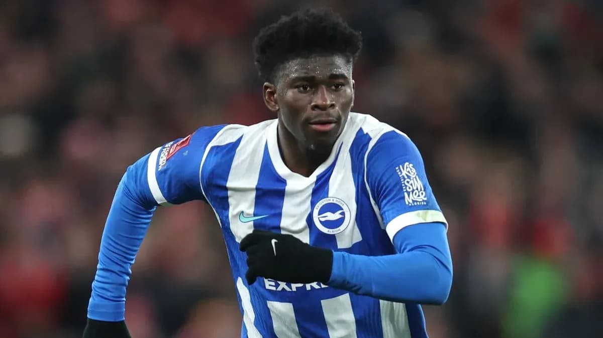 Jugador de Brighton corriendo durante un partido Jugador de Brighton corriendo durante un partido
