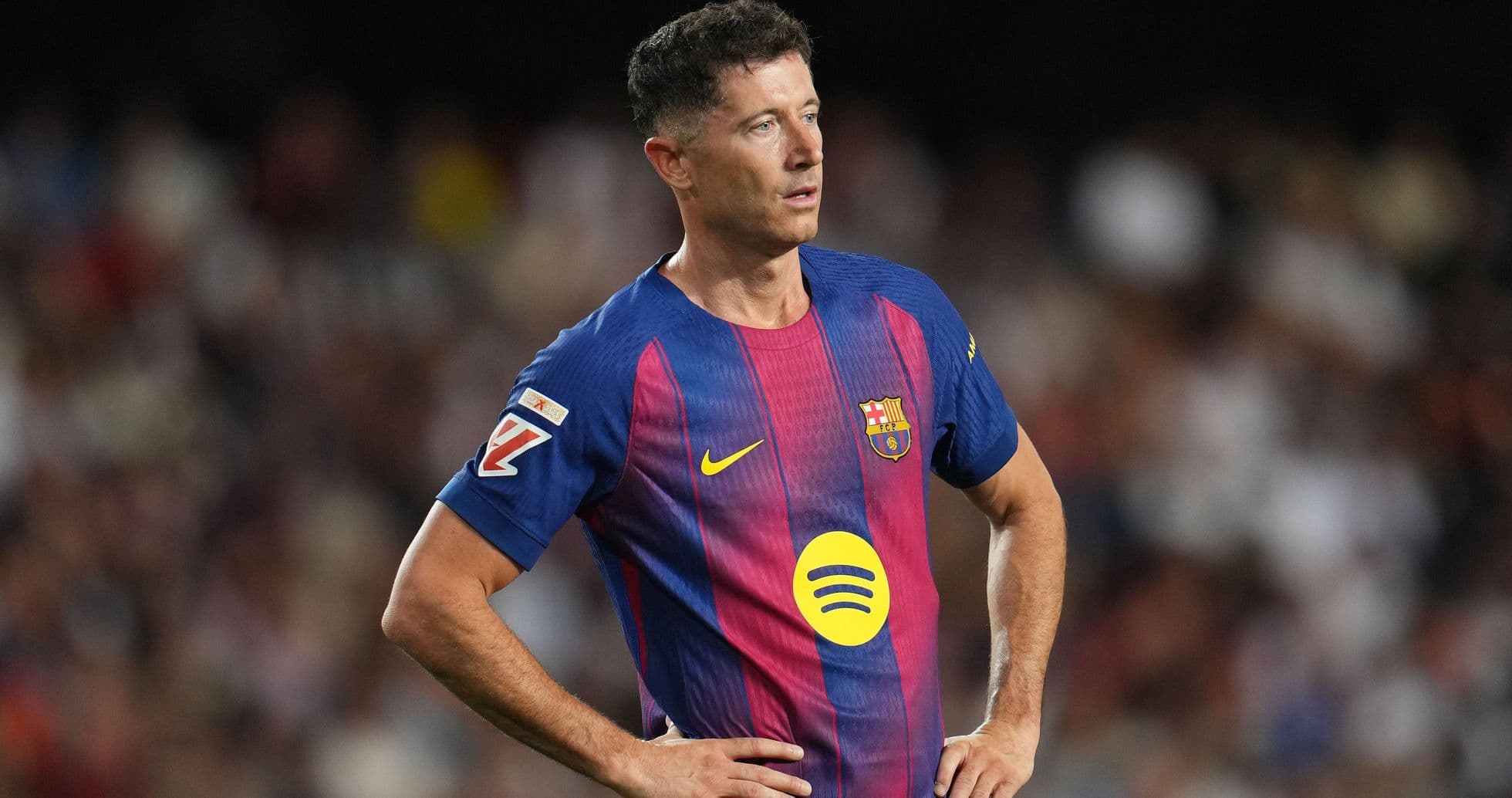 Jugador de Barcelona en acción durante el partido Jugador de Barcelona en acción durante el partido