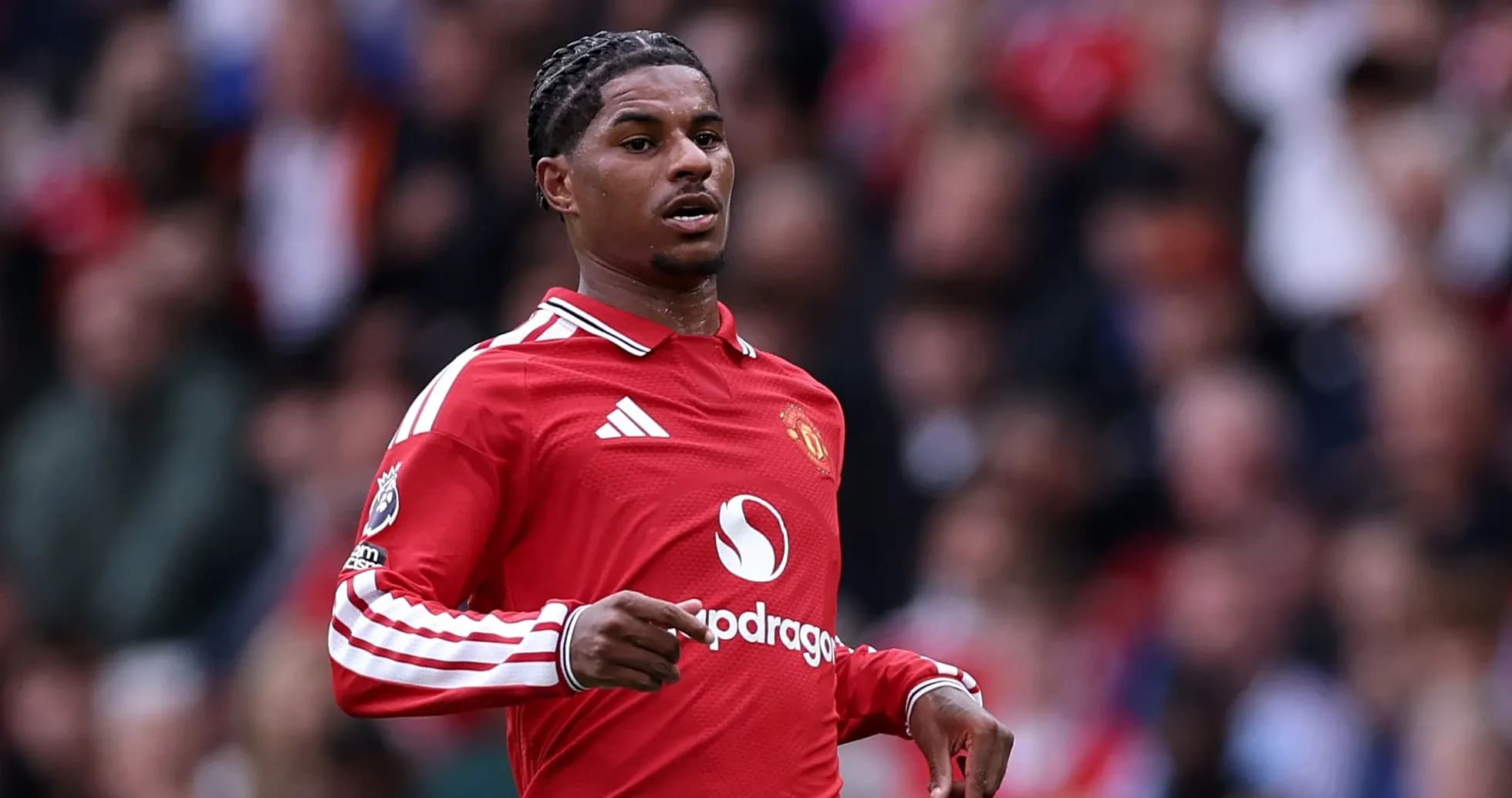 Jugador de Manchester United en acción en el campo Jugador de Manchester United en acción en el campo