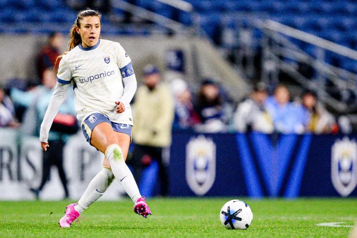Jugadora de Seattle Reign FC en acción Jugadora de Seattle Reign FC en acción