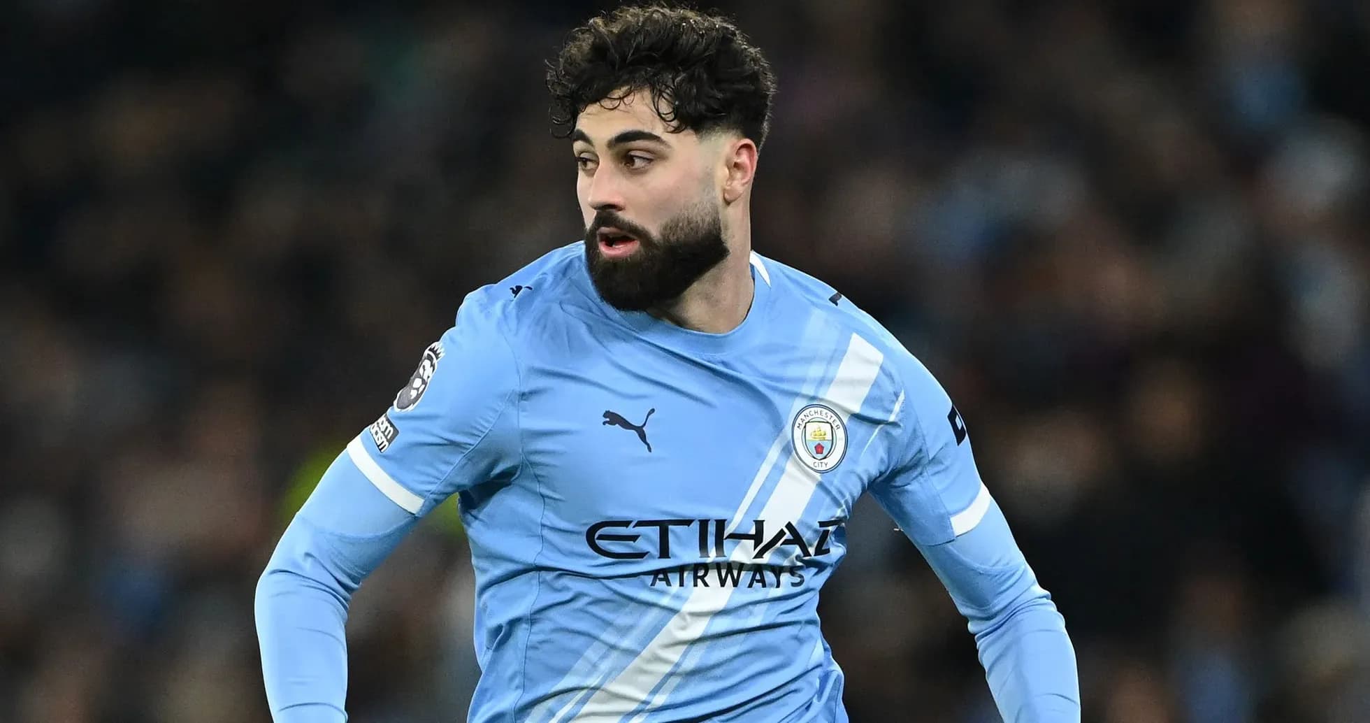 Jugador de Manchester City en acción durante el partido Jugador de Manchester City en acción durante el partido