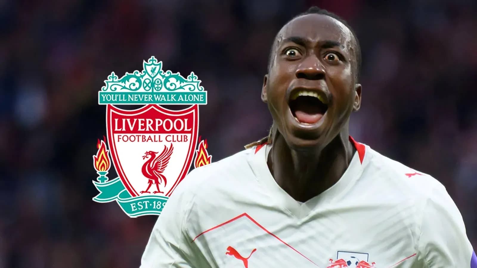 Jugador celebrando un gol con el logo de Liverpool Jugador celebrando un gol con el logo de Liverpool