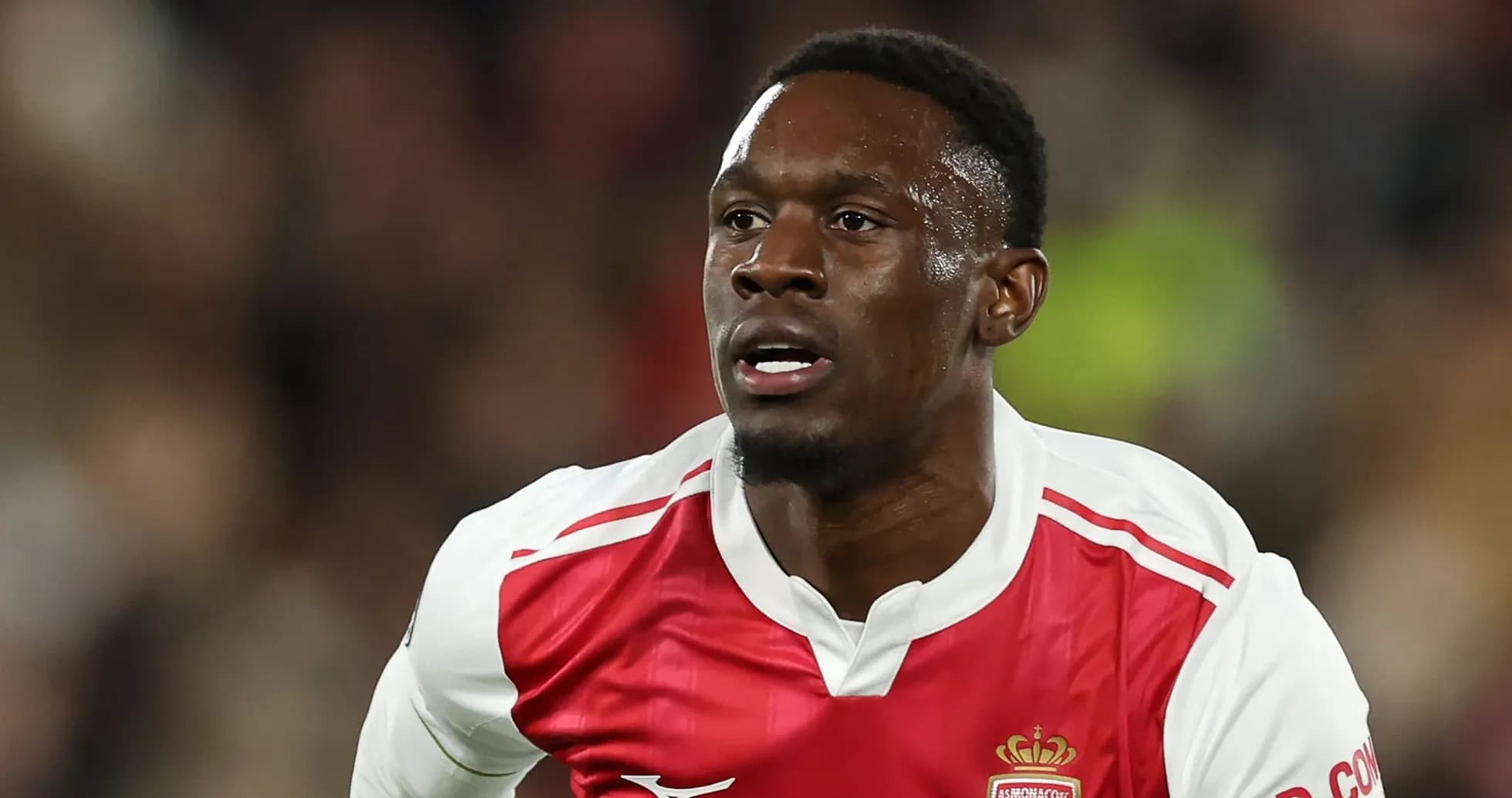 Jugador de AS Monaco corriendo durante un partido Jugador de AS Monaco corriendo durante un partido