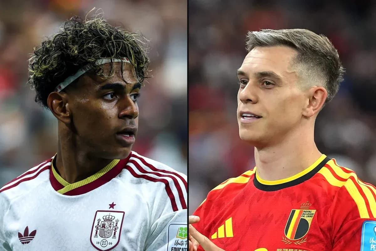 Jugadores de España y Bélgica en partido de fútbol Jugadores de España y Bélgica en partido de fútbol