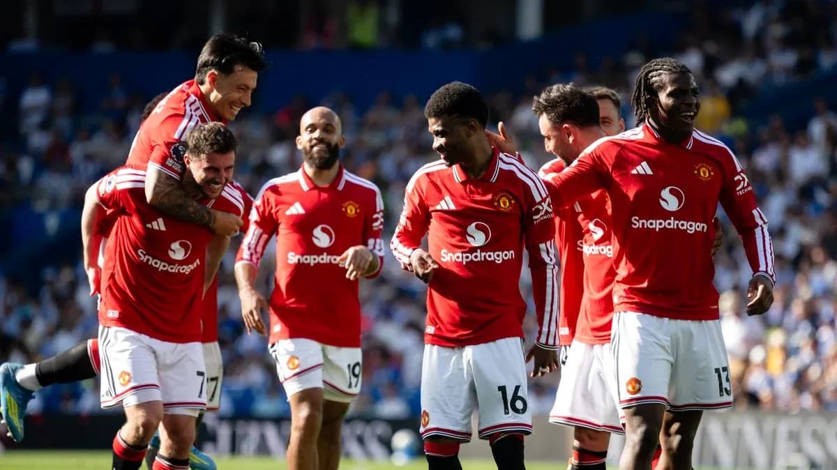 Jugadores de Manchester United celebrando un gol Jugadores de Manchester United celebrando un gol