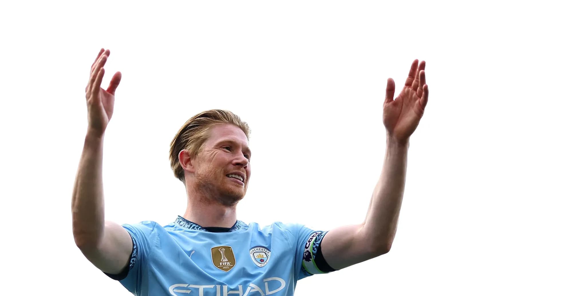Jugador de Manchester City levantando las manos Jugador de Manchester City levantando las manos